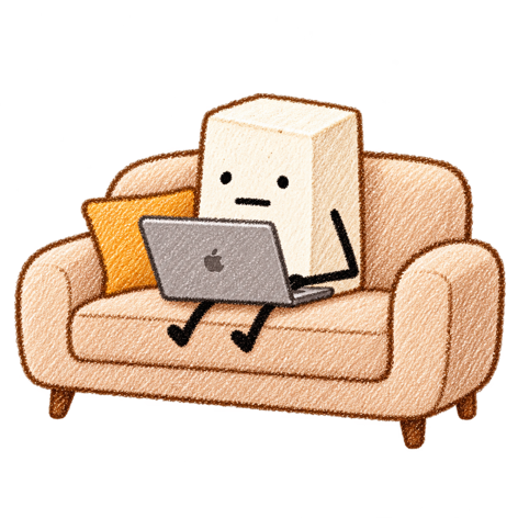 Sofatofu mascot calmly working on a laptop from a sofa